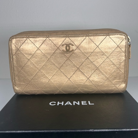 Handbags - Authentic gold Chanel matelasse zippy wallet